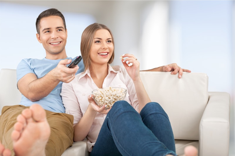 Happy-Couple-Watching-TV